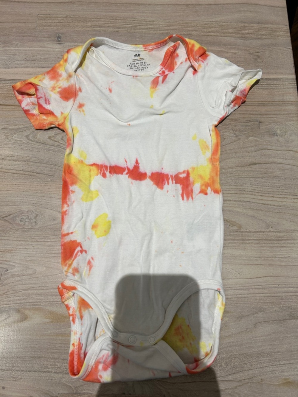 H&M Tie-Dye Short Sleeve Baby Bodysuit in White, Orange & Yellow